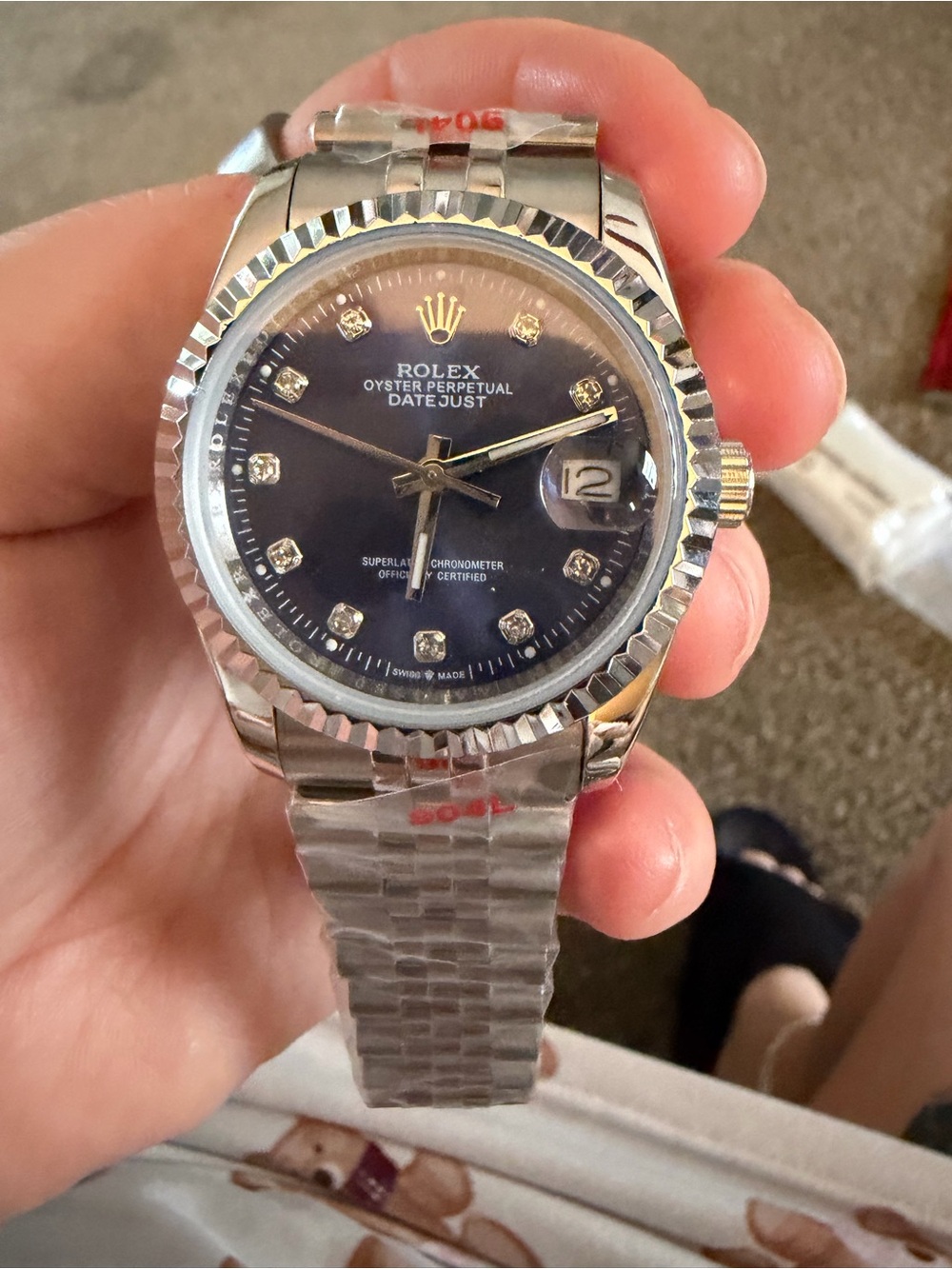 Women’s 36mm silver Watch with dark blue  Dial and Gold Accents
